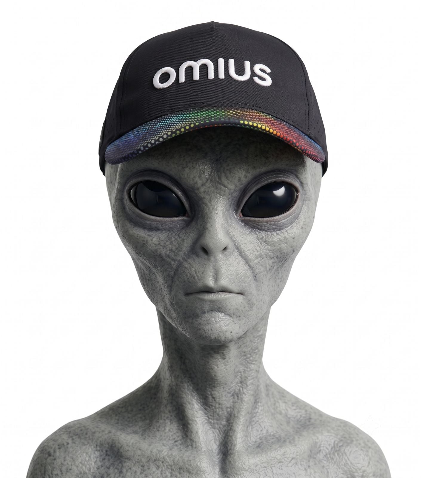 Grey alien character wearing the OMIUS Off Duty Cap on a studio grey background