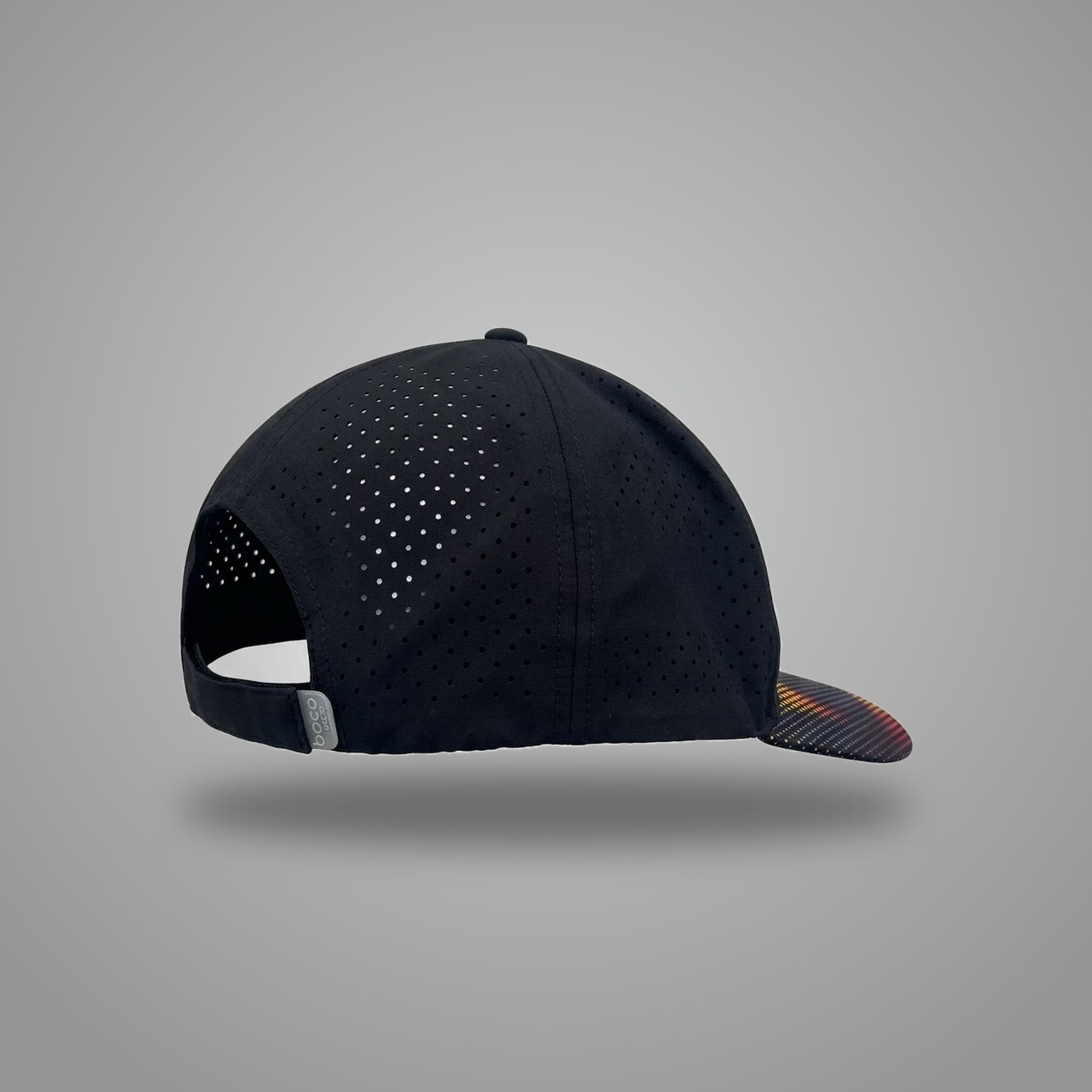 Black OMIUS Off Duty Cap, front view with embroidered logo and colorful dotted brim.