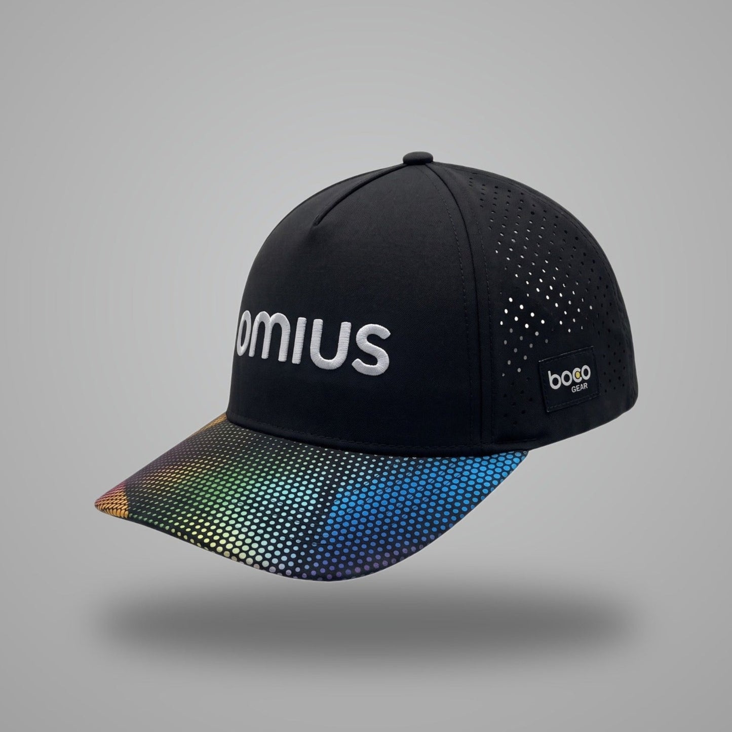 Black OMIUS Off Duty Cap, front view with embroidered logo and colorful dotted brim